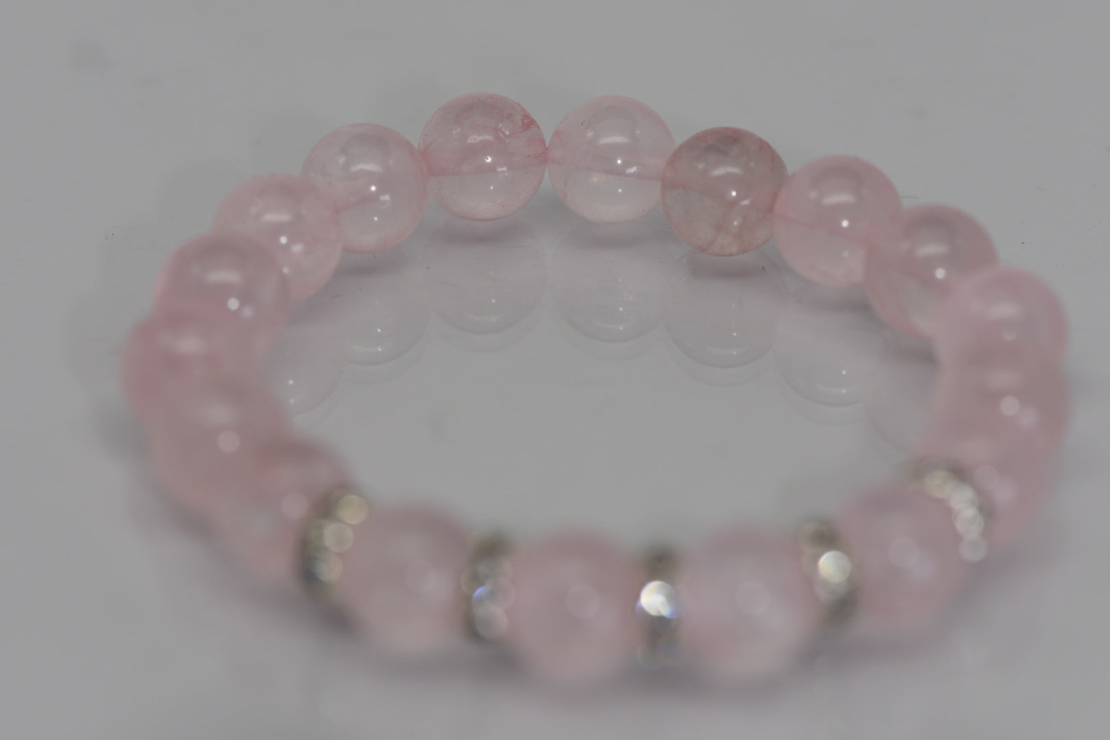 Rose quartz bracelet with rhinestone spacers