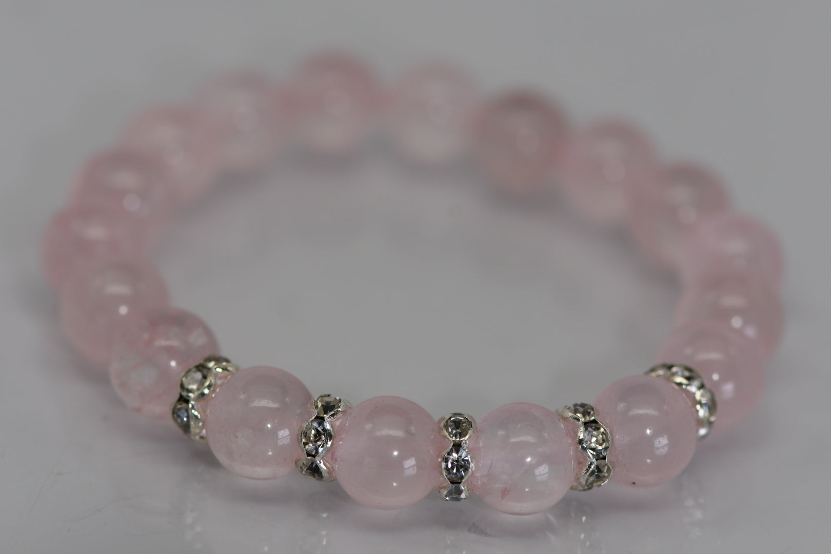 Rose quartz bracelet with rhinestone spacers