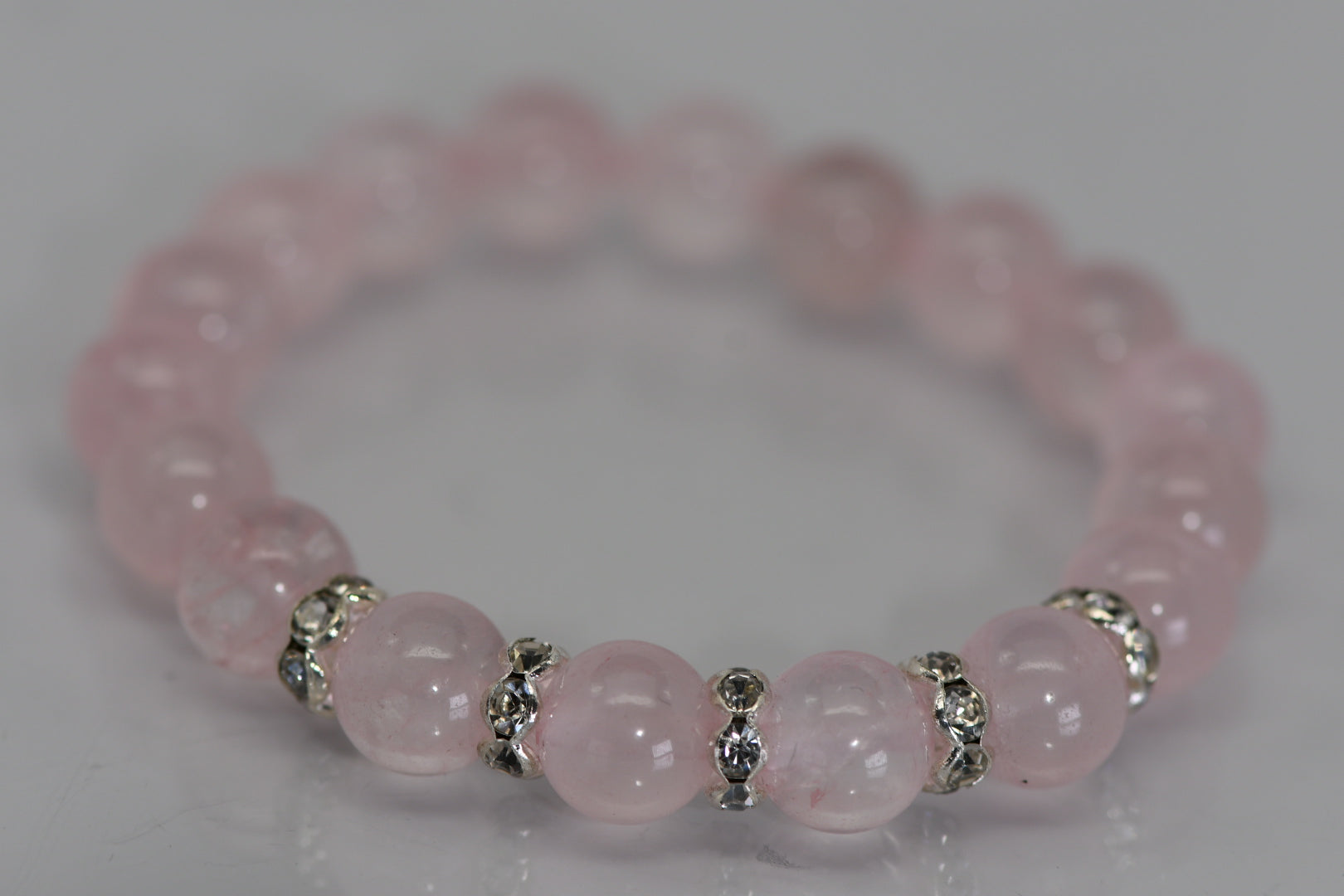 Rose quartz bracelet with rhinestone spacers