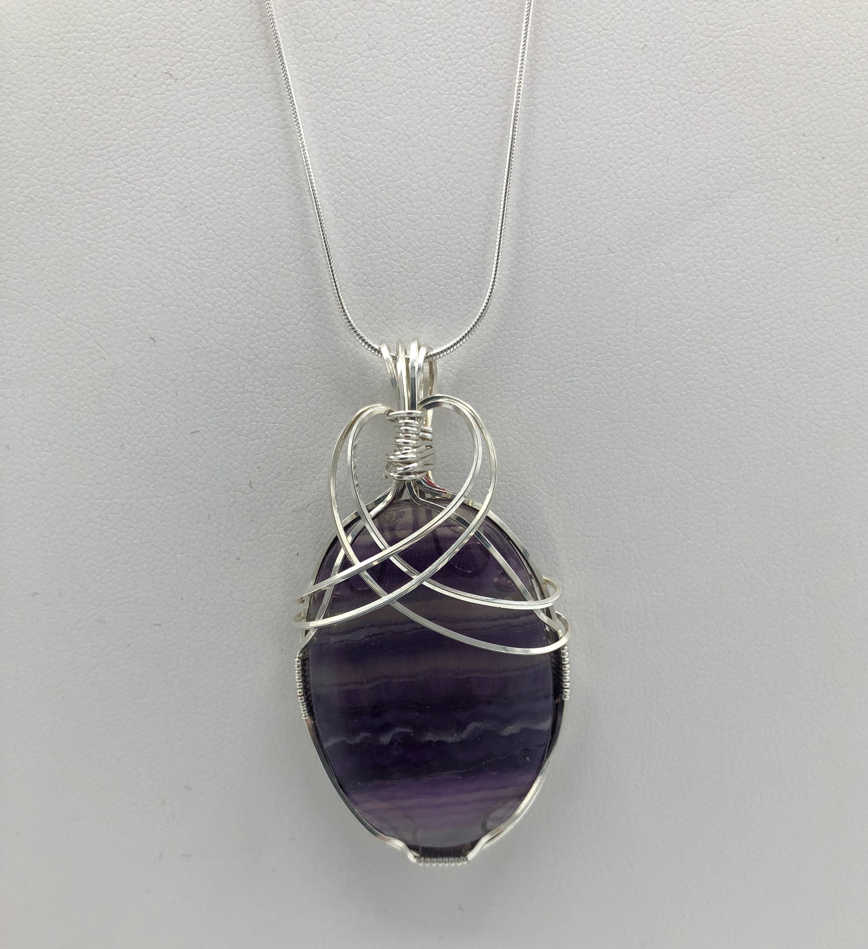 Beautiful Oval Purple Fluorite Cabochon - Wire wrapped