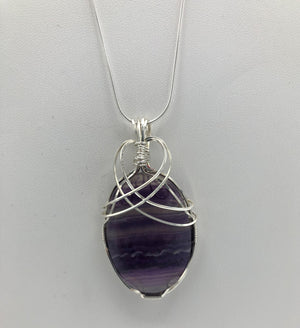 Beautiful Oval Purple Fluorite Cabochon - Wire wrapped