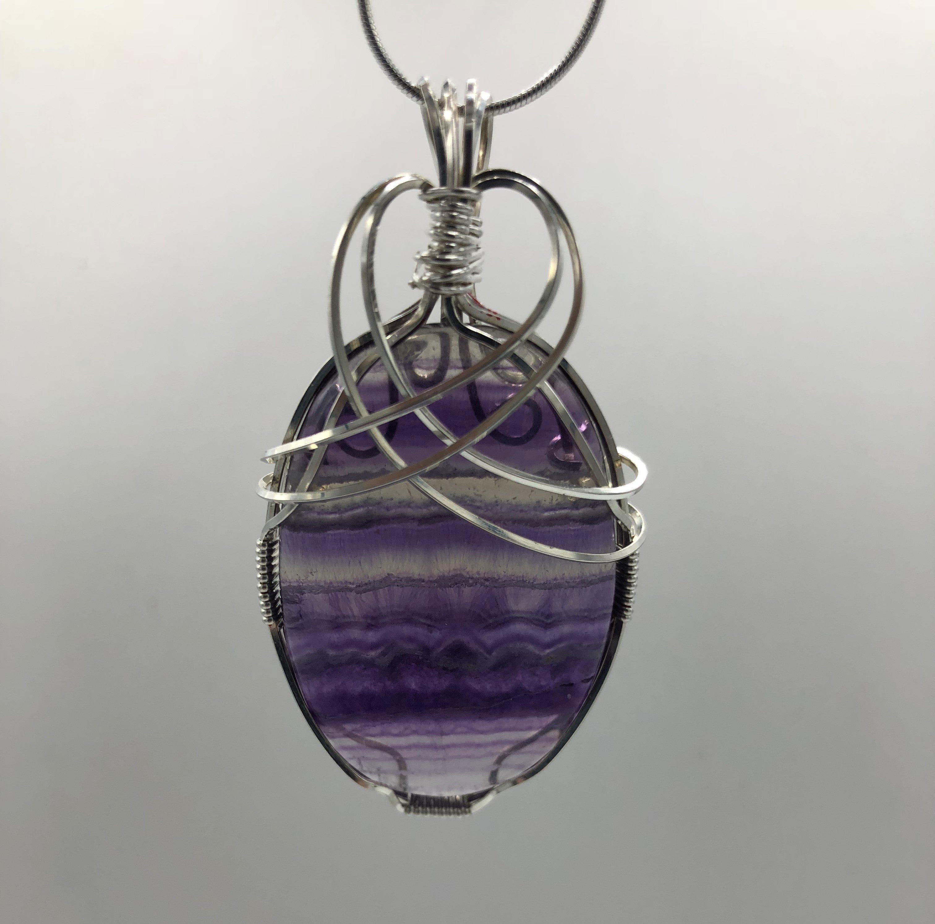 Beautiful Oval Purple Fluorite Cabochon - Wire wrapped
