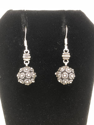 Sterling Earrings Silver detailed ball with antique tone rope design at top.